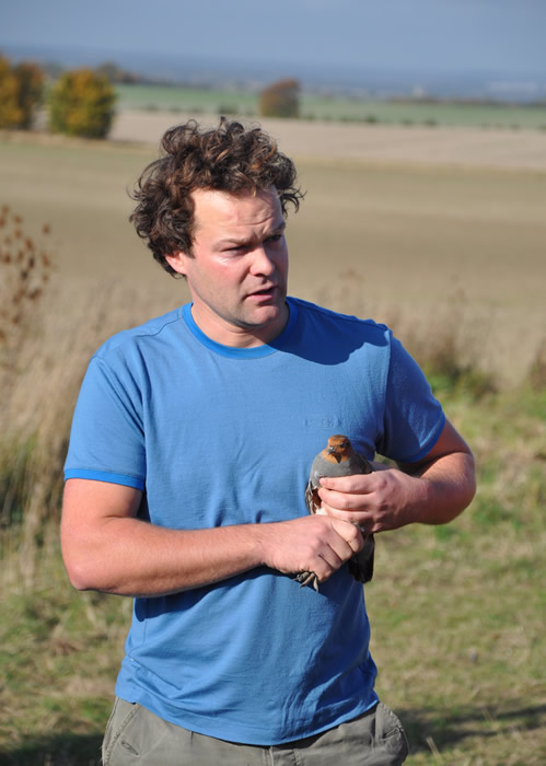 Dr Francis Buner a research scientists with the Game & Wildlife Conservation Trust is radio-tracking grey partridges this winter to investigate huge over-winter losses