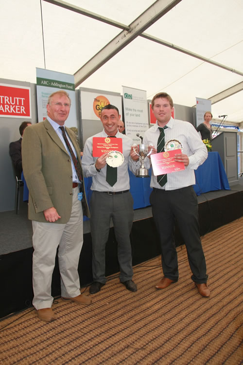 Greg Bliss Chairman of the Tenant Farmers Association presents Michael Nelson and Steven Powley with their award at the 2010 CLA Game Fair