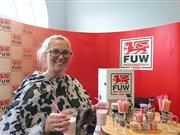 Farming union hands out free samples of milk to Aberystwyth University freshers to show benefits of dairy FUW Ceredigion County Executive Officer Mared Rand Jones promotes benefits of milk and udder-things at Aberystwyth University Freshers Fair