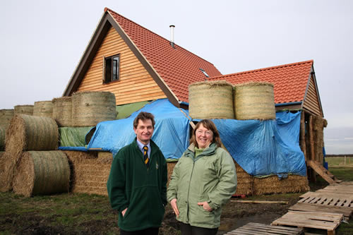 Carol with Yorkshire Agricultural Society Chief Executive Nigel Pulling in front of one of  Carol’s straw bale buildings