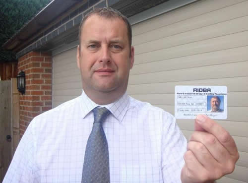 RIDBA council chairman Adam Minshall with the new net rigger training card.