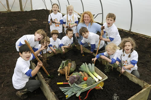 TV personality and expert gardener Charlie Dimmock launching the Dig Down South West campaign with schoolchildren