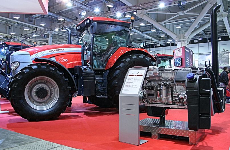 A 6.7-litre Betapower six-cylinder engine equipped with the SCR system shown alongside the prototype McCormick X70 tractor.