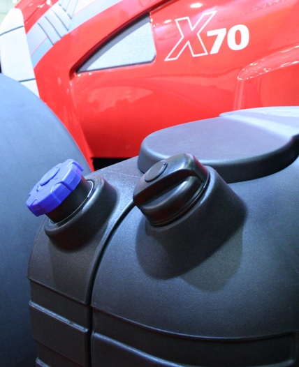 A small amount of AdBlue aqueous urea solution, held in a small reservoir on the fuel tank, is injected into the exhaust system to neutralise polluting nitrogen oxides (NOx),