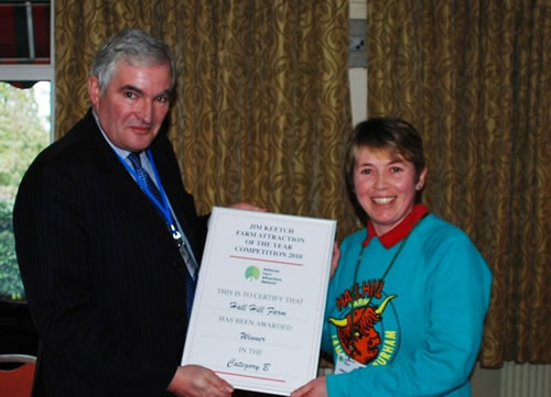 Lord Henley presents Ann Darlington of Hall Hill Farm with Farm Attraction of the Year Award