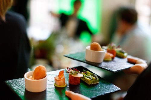 starter comprising sole & dill scotch egg, fine tart of Wye Valley asparagus, seared scallop and tartare, all served on slate