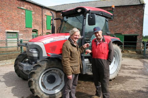 Will Charnley (left) of John Charnley & Sons with dairy farmer David Lomas and his 100hp McCormick CX110 XtraShift.