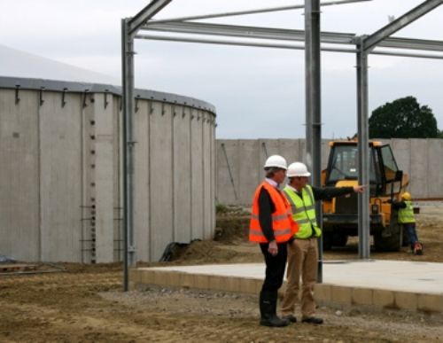 John Day of EnviTec (left) discusses technical points with Gavin Davies, farms manager at Stowell Farms.