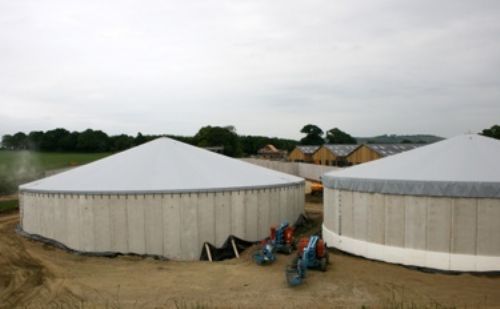 The biogas plant taking shape at Stowell Farms with the new dairy in the background.