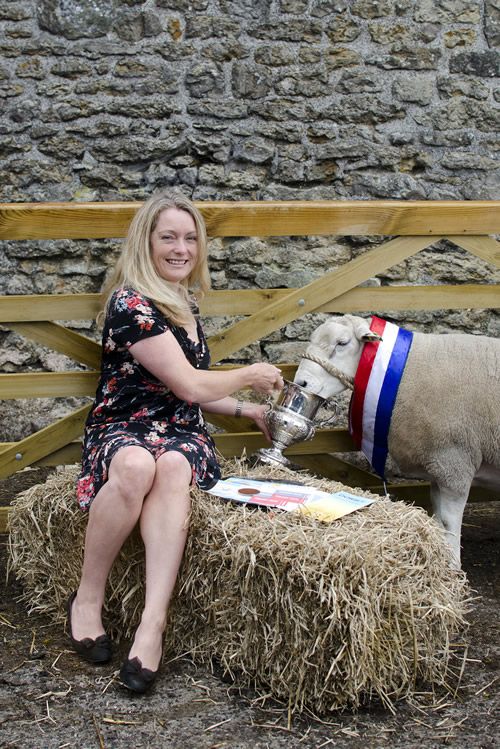Simon the sheep with Dorset County Show Secretary Sam Mackenzie-Green at Down Barn Farm, Beaminster