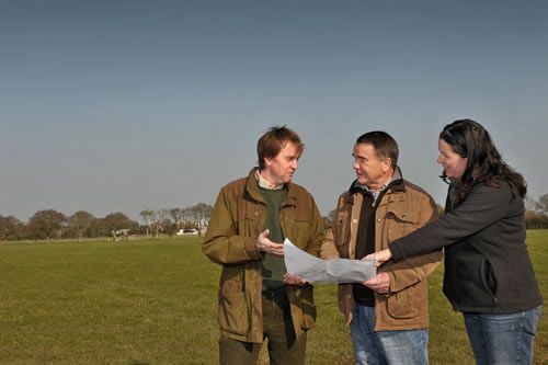 Pete Durnell, Leon Crouch landowner and Julie Stubbs looking at plans for the land in March 2011