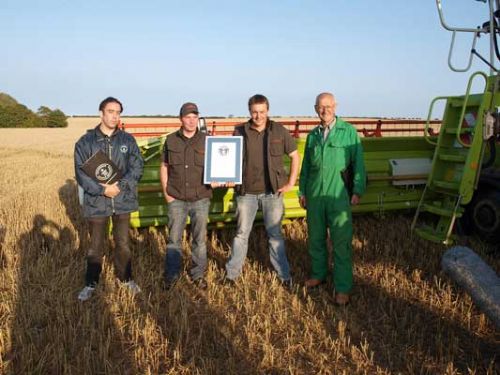 World Record breakers: left to right – Jack Brockbank (Guinness World Records), combine operators Jens Broer and Christian Mecmann and Bill Basford (independent machinery consultant)