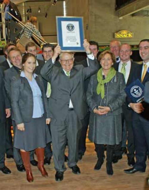 Helmut Claas celebrates the new Combine Harvesting World Record. With him are Mrs Cathrina Claas-Muhlhauser (left), Mrs Erika Claas and Mr Jack Brockbank from Guinness World Records.