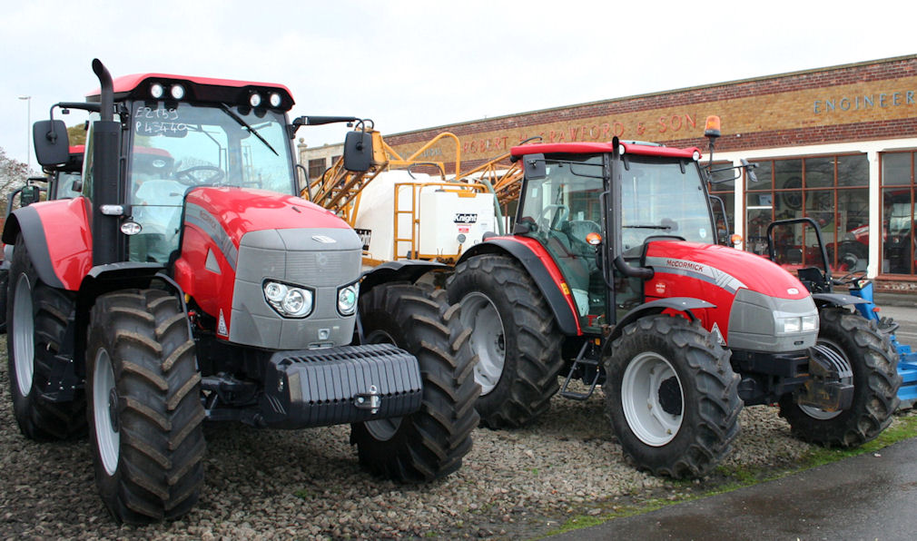 McCormick MTX (left) and T-Max tractors lined up in front of the characterful showroom of Robert H Crawford & Son at Frithville near Boston, Lincs.