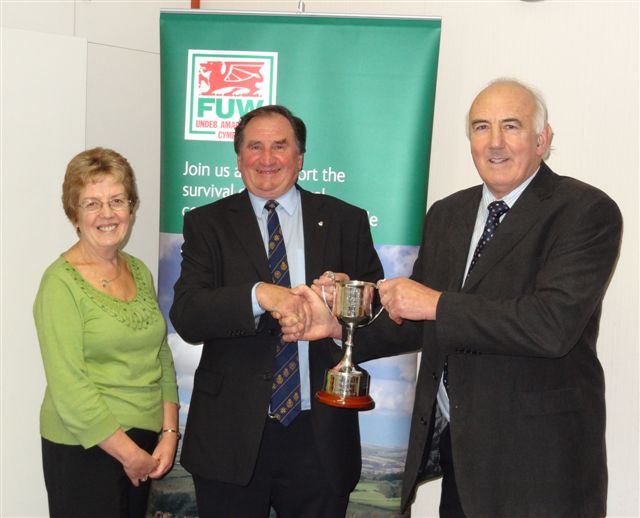 OUTSTANDING SERVICE: From left, Meinir Bartlett, Roy Davies FRAgS and United Counties’ Agricultural Hunters Society chairman Lynn Davies ARAgS.