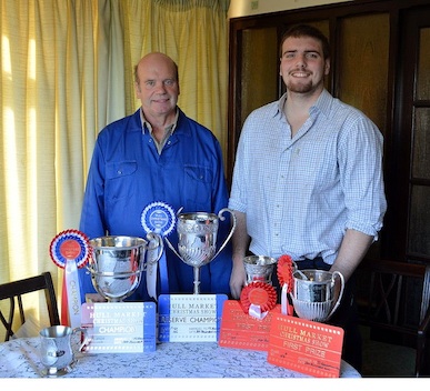 Ian Broumpton (left) with his son, Daniel, with the trophies they picked up at Hull Market Christmas Show and Sale.