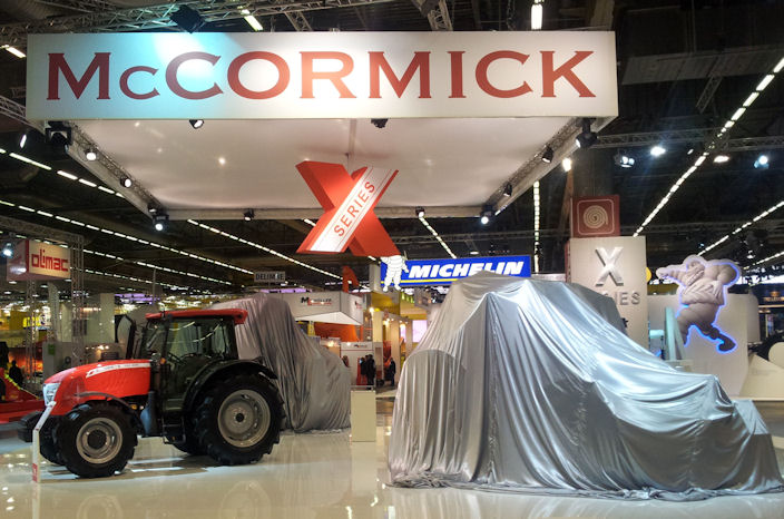 Under wraps – the surprise tractor is kept under the covers alongside the new McCormick X50 Series tractor seen at the LAMMA show.