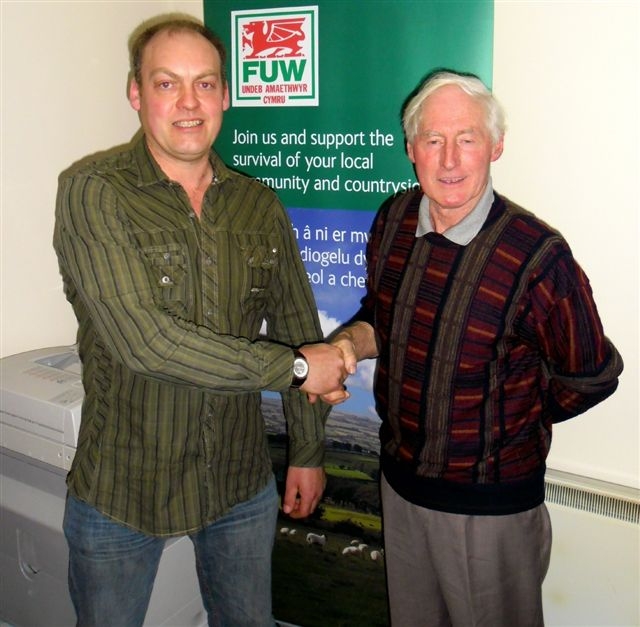 Glyn Jones (right) congratulates Richard Walker on his election.