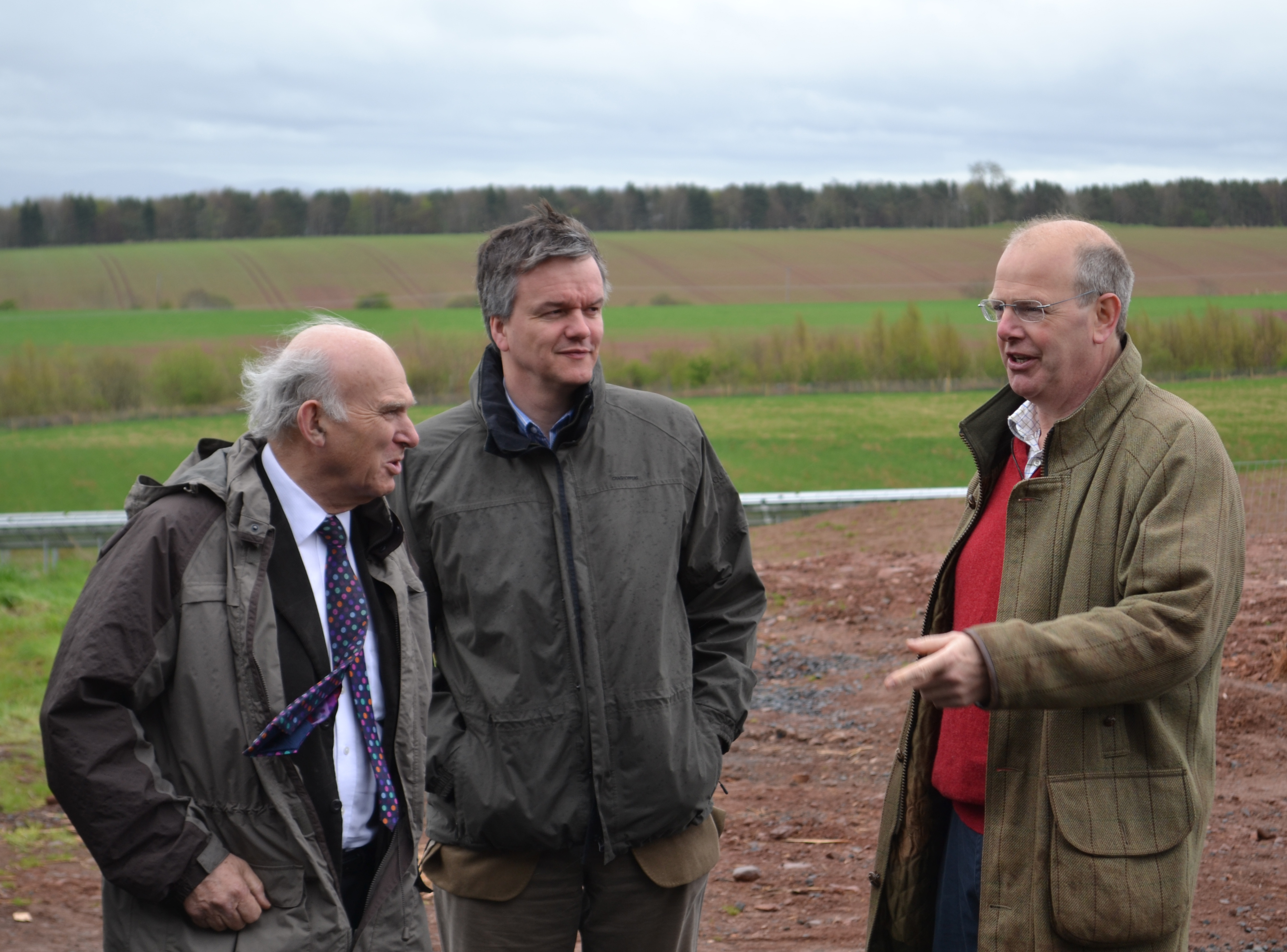 Vince Cable, Michale Moore and John Seed discussing the use of Renewable Energy on farms