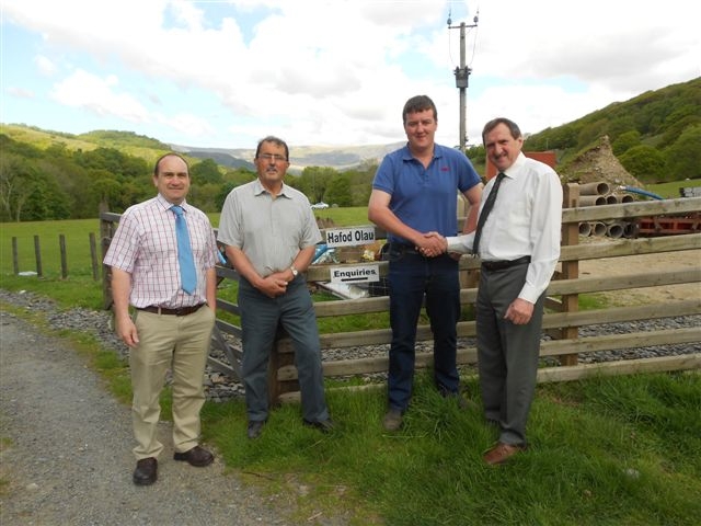 RARE HOME VISIT: Emyr Jones (furthest right) greets Will Ellis on a rare visit home earlier this month with Huw Jones (furthest left) and Owain Thomas.