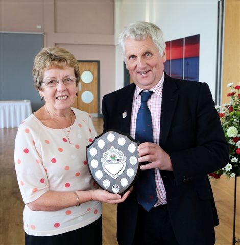 WINNER: Meinir Bartlett receives the Owen Slaymaker Award from Glyn Roberts.