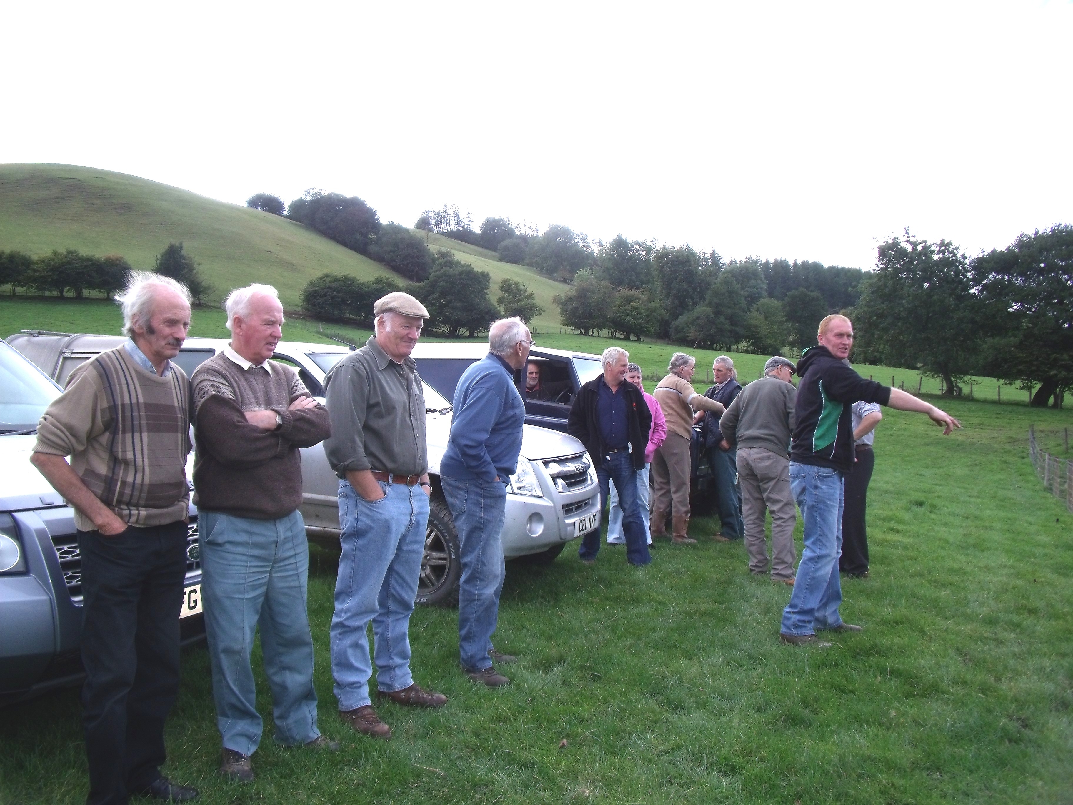 Alwyn Vaughan (furthest right) showing his farmland to visitors.