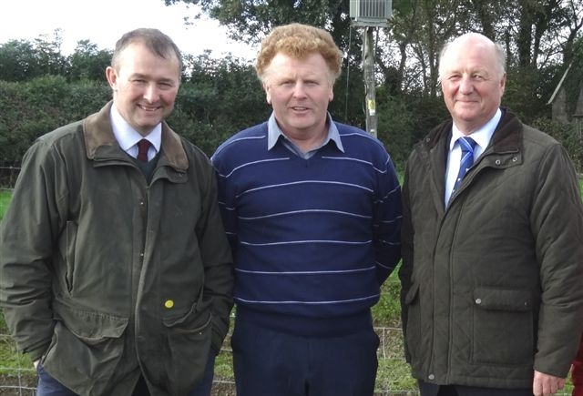 FARM VISIT: From left, Carmarthen West and South Pembrokeshire MP Simon Hart, farmer Dyfrig Davies and Sir Jim. 