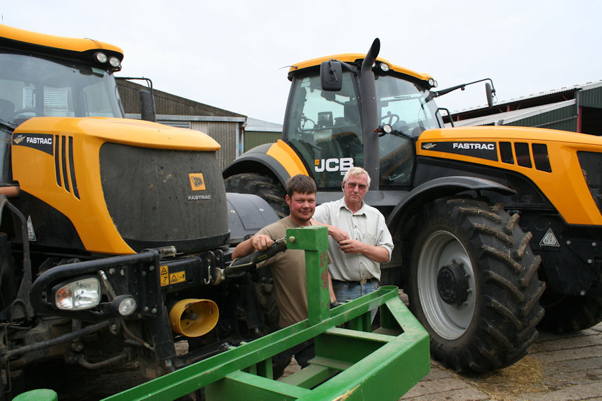 Graham Lawman and his son Andrew with their Fastrac tractors supplied by G & J Peck’s Ramsey branch.