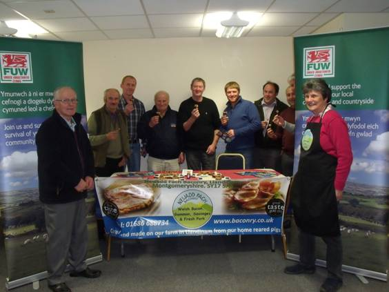 Ithel and Linda Brown with members of the FUW Montgomeryshire county executive committee who enjoyed a banquet of bangers.