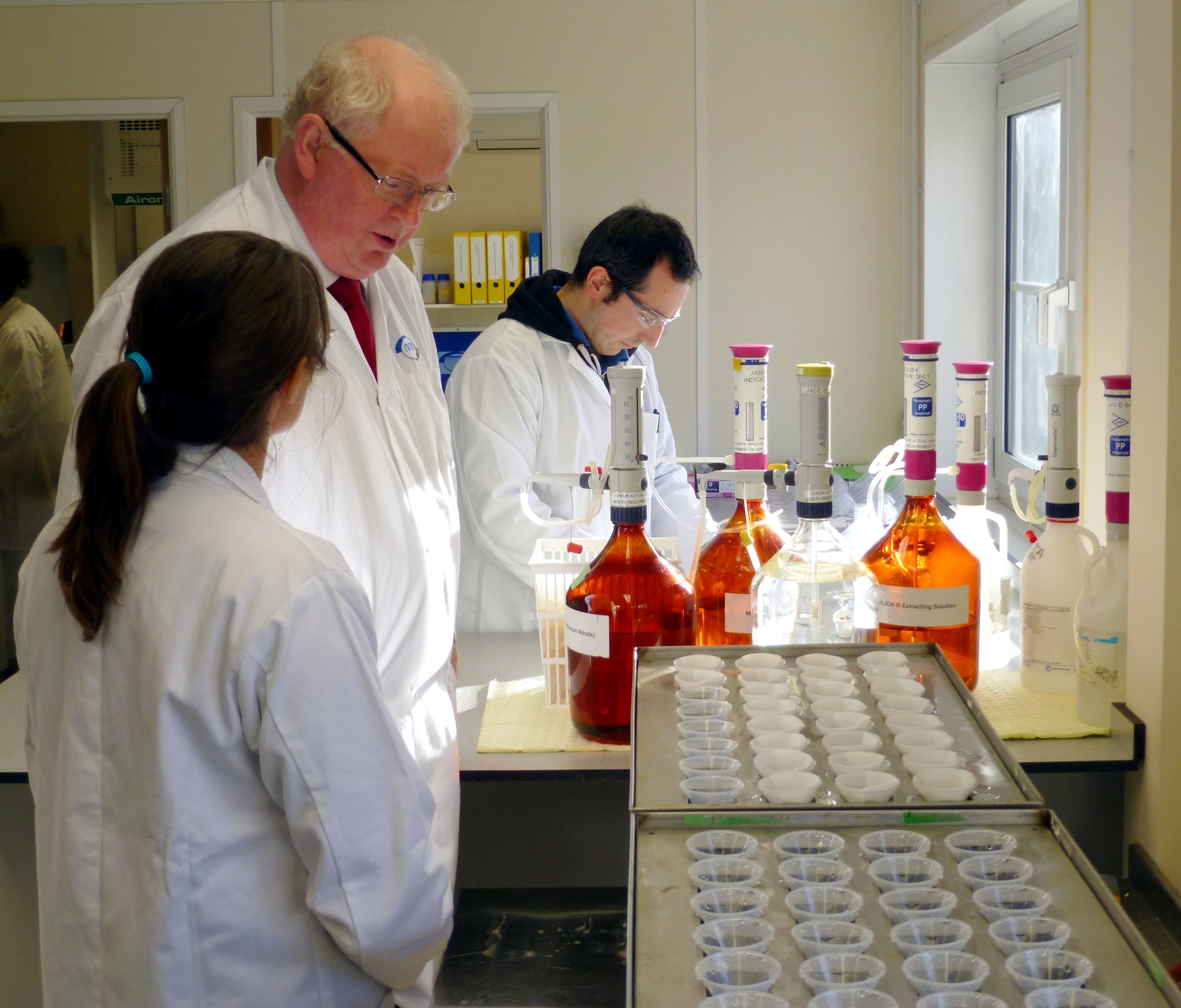 2.	Sir Ben Gill takes a tour of the new NRM laboratory in Swaffham guided by section head Annie Sneath. Also pictured is NRM’s Bruno Silva.