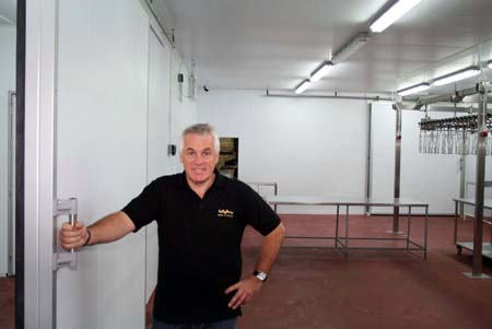 Paul Kelly checking the new facility  before processing begins