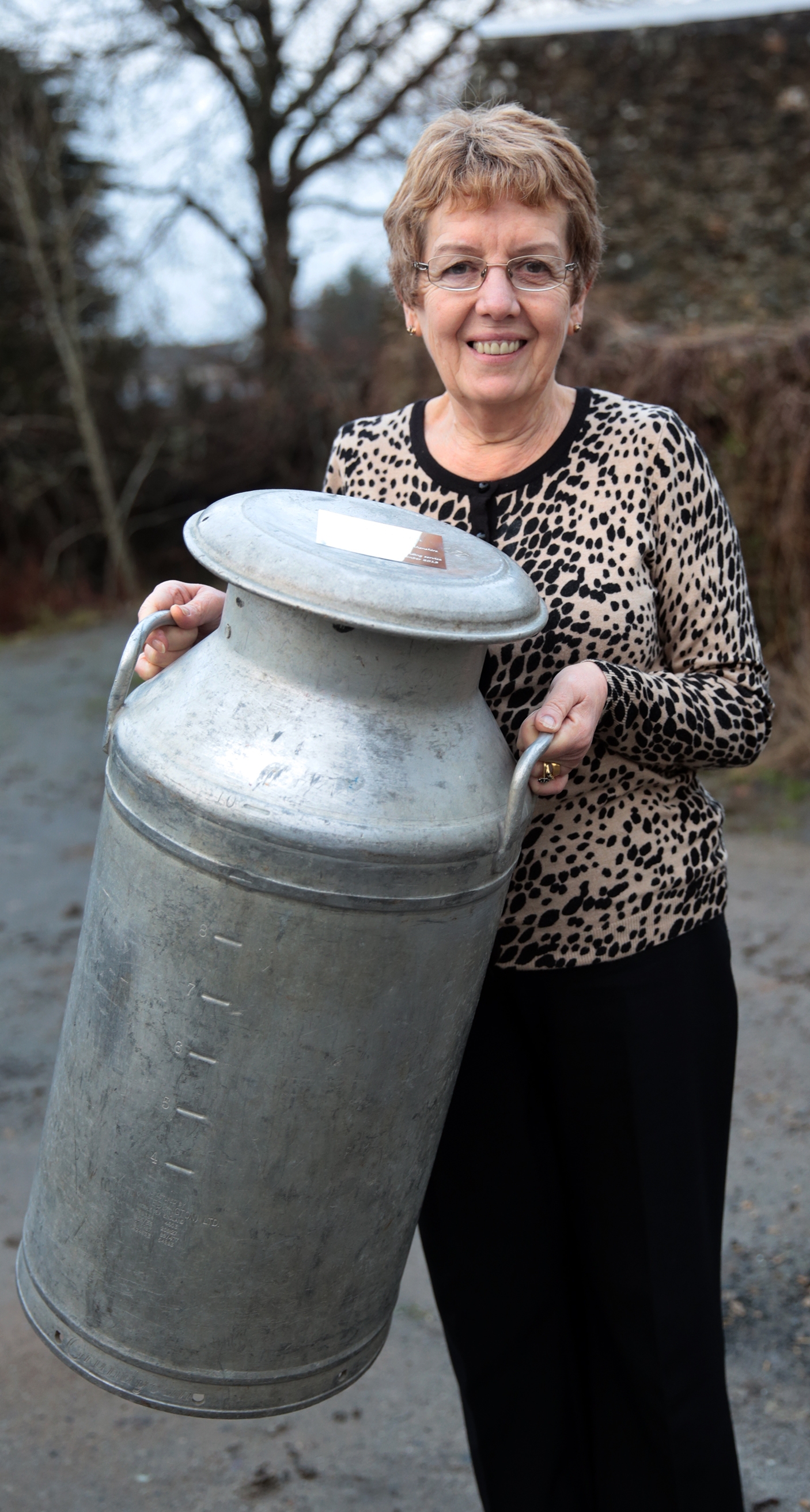 FUW officer's retirement present is a milk churn! FarmingUK News