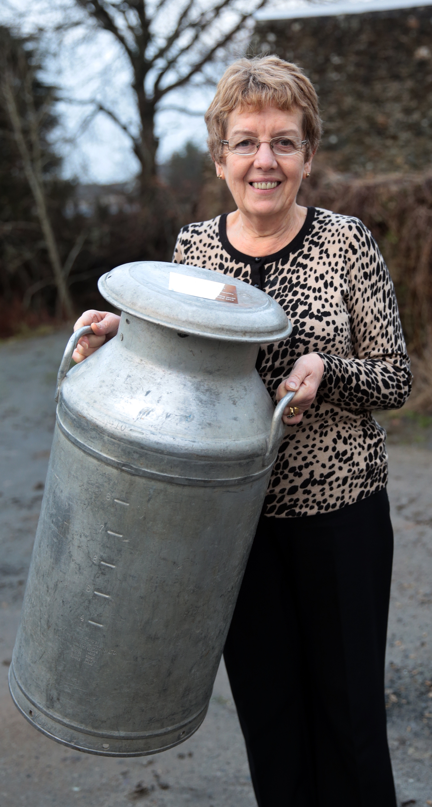 Meinir Bartlett with her milk churn.