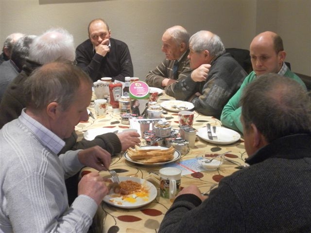 Aled Rees at the head of the table discussing CAP with local farmers. 
