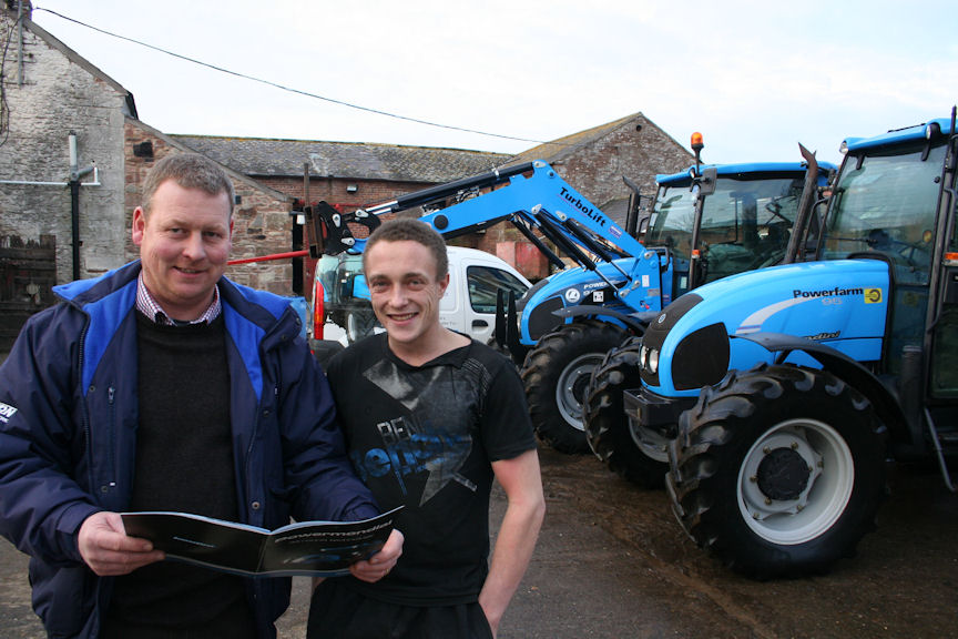 Tony Blackburn (left) of Newton Trailer Centre tempts Will Hornsby with a look through the Landini tractor catalogue.