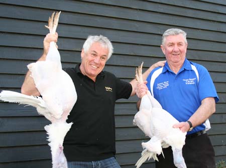 Paul Kelly [right] congratulating Vincent Pilkington on winning