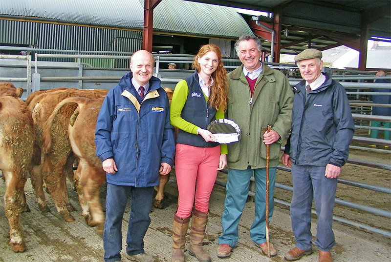 Kimberley Dudley of Allflex presents the silver salver to Simon Bedell watched by judges Andrew Hough (left) and Bob Ford.