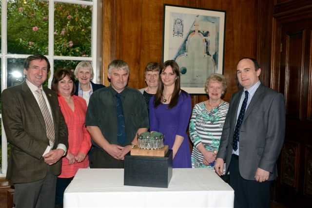 FUW’s Penllyn and Edeyrnion ladies section members, with crown maker Mari Eluned, present the crown to eisteddfod executive chairman Hedd Pugh watched by (far left) FUW president Emyr Jones and (far right) Huw Jones.