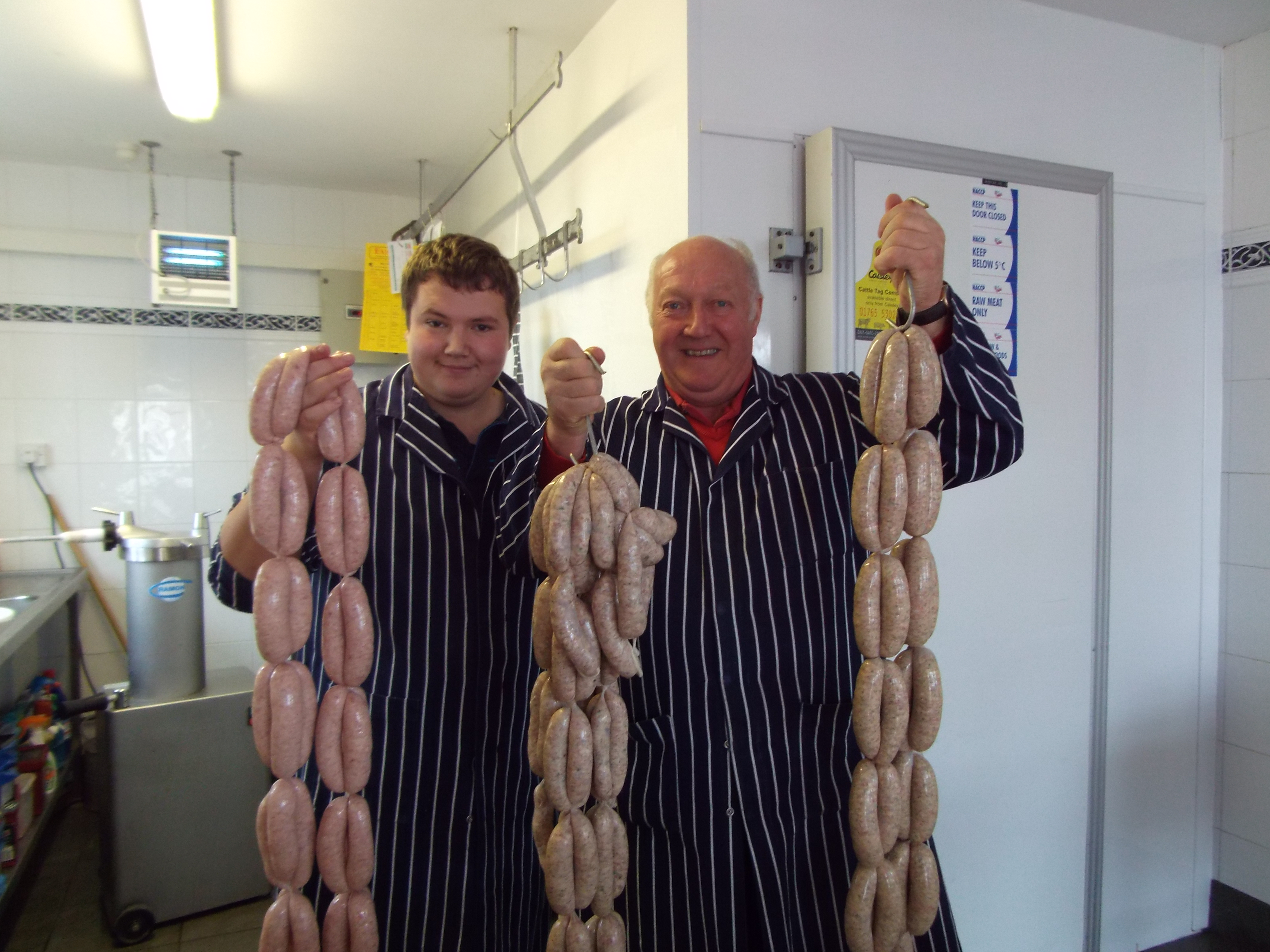 Sion Jones with family farmer and butcher Ben Evans of Llanon butchers