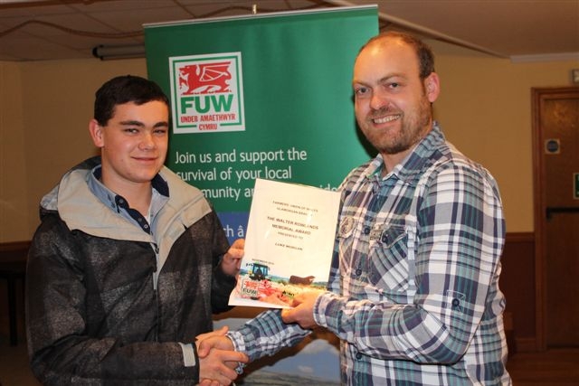 Richard Walker,right, presents the certificate to Luke Morgan