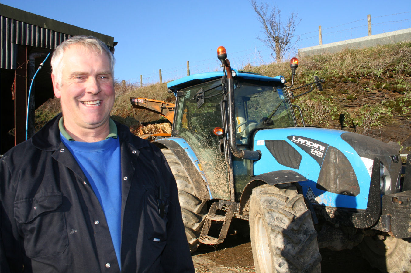 Andrew Kneebone with one of his two Landini 5-H tractors.