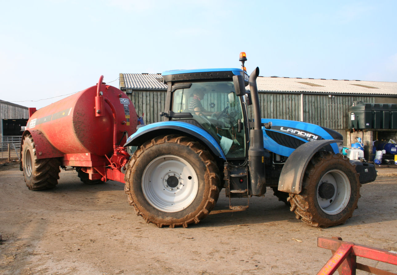 The powerful tractor is still a handy size around the farm buildings.