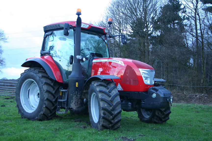 The new tractor will perform routine field and yard duties on the farm.