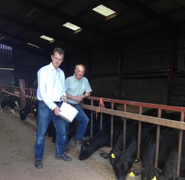 David Davies on farm with Lyndon Edwards