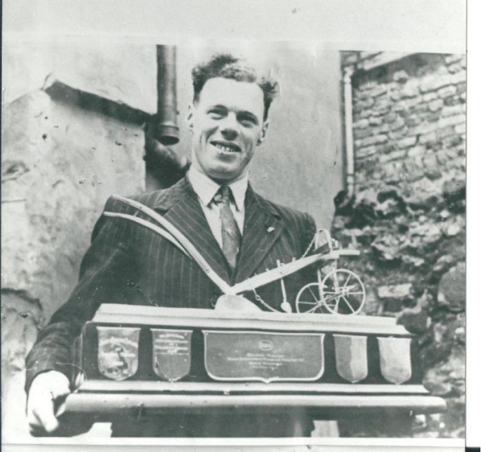 Hugh Barr with the world champion ploughman trophy back in the 50s