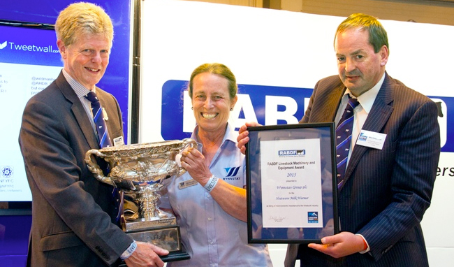 Gill Dickson receives the RABDF Livestock Machinery and Equipment Award from left, RABDF president, Prof David Leaver and Council member, Angus Wielkopolski