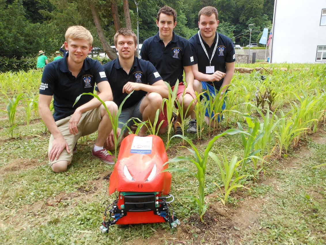 Florence, with student engineers, pictured at the Field Robot Event held in Slovenia