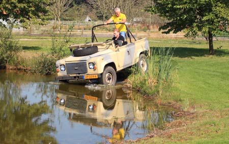   Geert Coolen at the wheel with Paul Kelly