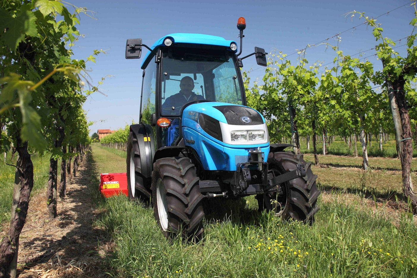 Landini Mistral compact is popular for mowing and pulling ‘fruit trains’.
