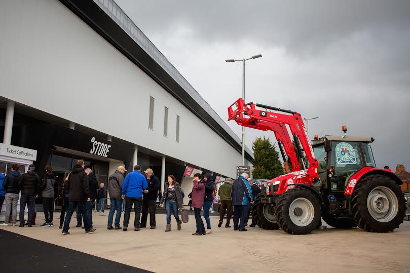 The Massey Ferguson was branded with the Red Tractor logo to show the 6,500 fans what to look for when shopping for food